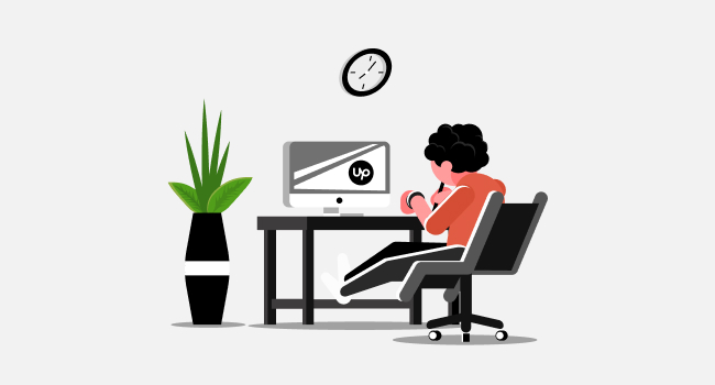 man sitting and working in front of a computer screen with Upwork logo in it