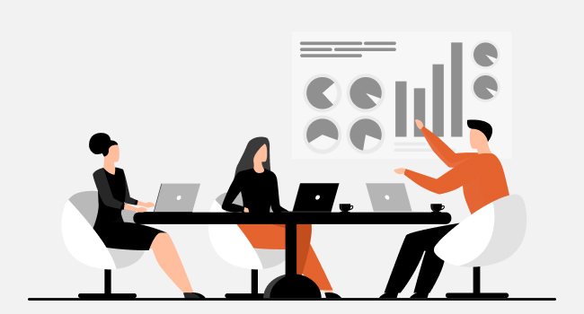three managers at the business meeting sitting with laptops and discussing a chart