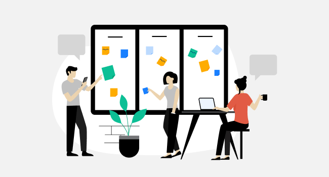 three managers working with a managers’ board and stickers on it